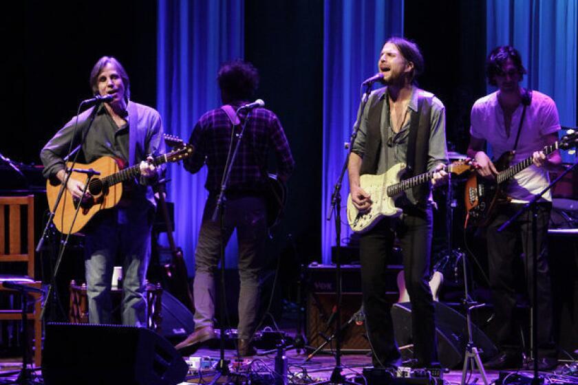 Jackson Browne, left, and singer-songwriter Jonathan Wilson will be among the performers at a Dec. 20 holiday benefit concert at the Troubadour in West Hollywood.