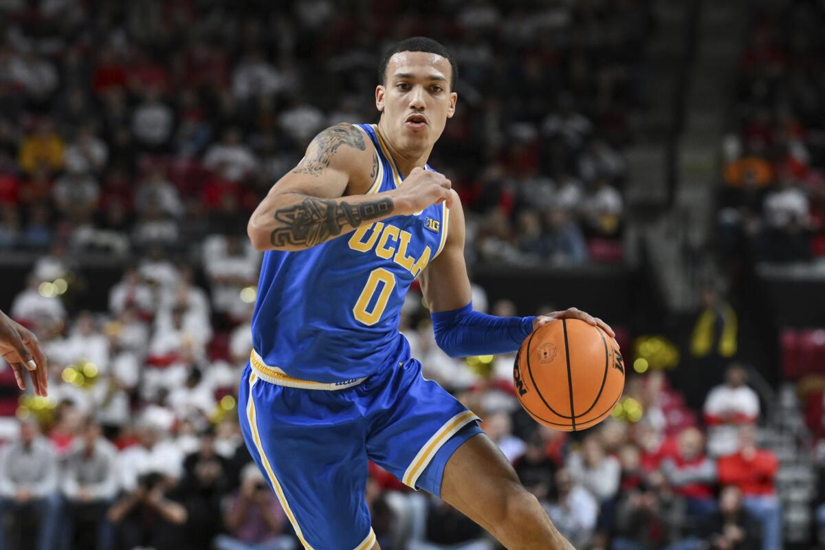 UCLA guard Kobe Johnson drives to the basket.