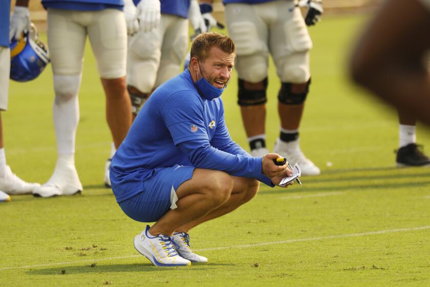 THOUSAND OAKS, CA - AUGUST 18: Los Angeles Rams head coach Sean McVay works with players.