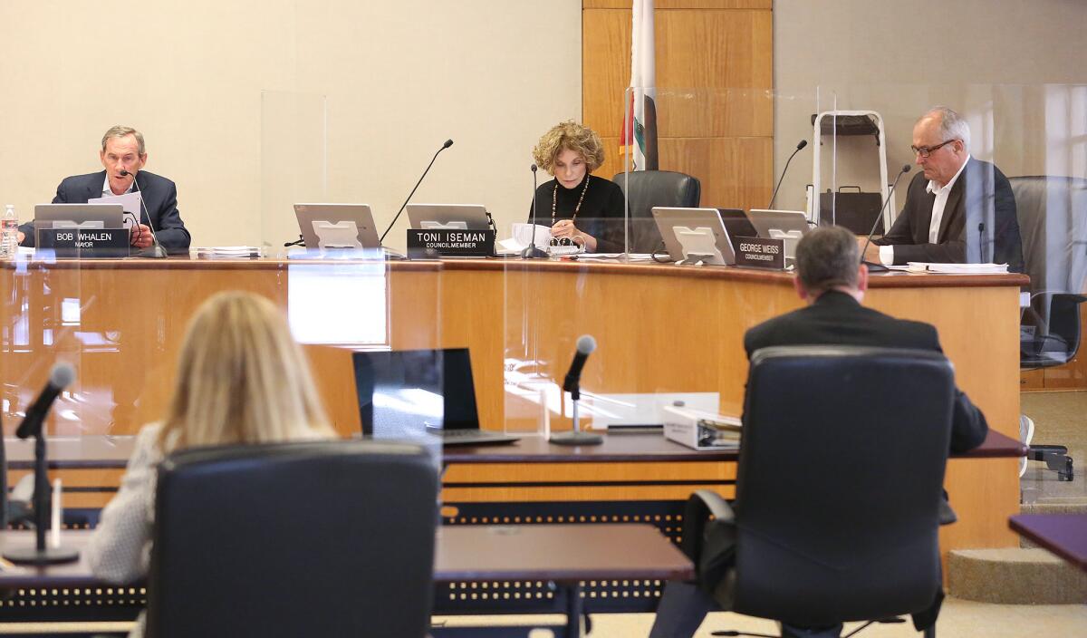 Laguna Beach Mayor Bob Whalen, left, Councilwoman Toni Iseman, center, and Councilman George Weiss on the dais.