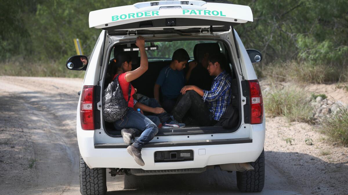 Children from Central America are picked up by U.S. Border Patrol after crossing the Rio Grande into Texas.