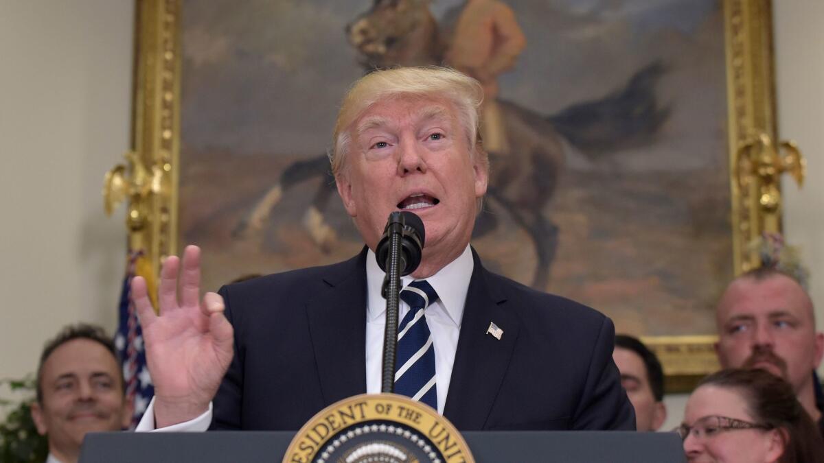 President Trump speaks in the Roosevelt Room of the White House on June 15.