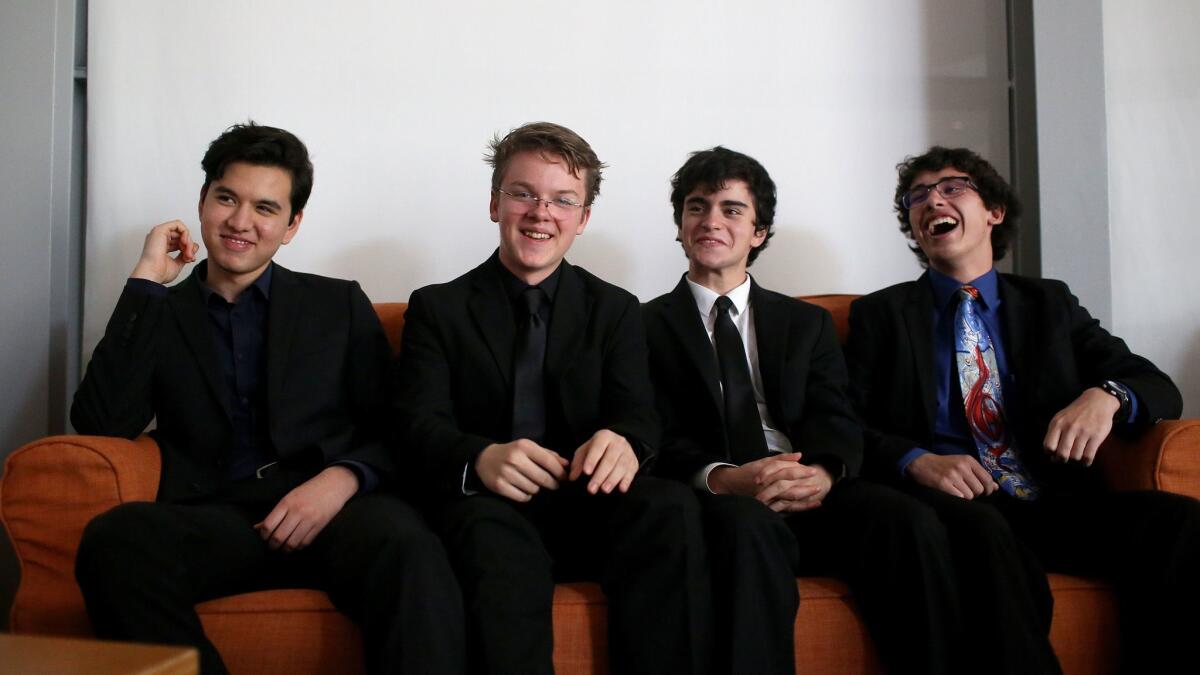 Teens Luca Mendoza, left, Benjamin Champion, Ethan Treiman and Robby Good had original compositions played by the Los Angeles Philharmonic.