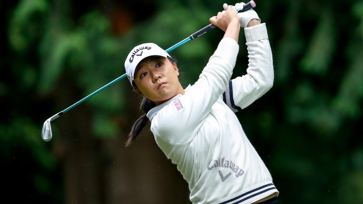 Lydia Ko hits her tee shot at No. 9 during the third round of the KPMG Women's PGA Championship at Sahalee Country Club on Saturday.