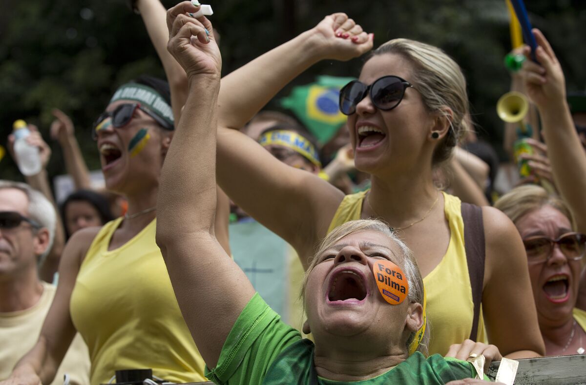 Demonstrators shout antigovernment slogans during a March 15 protest in Sao Paulo demanding the impeachment of Brazilian President Dilma Rousseff.