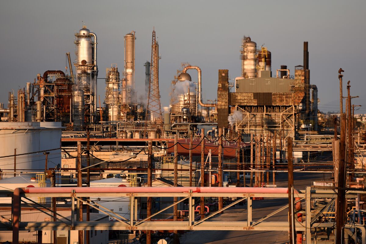 Scaffolding and smokestacks are seen at a Torrance refinery