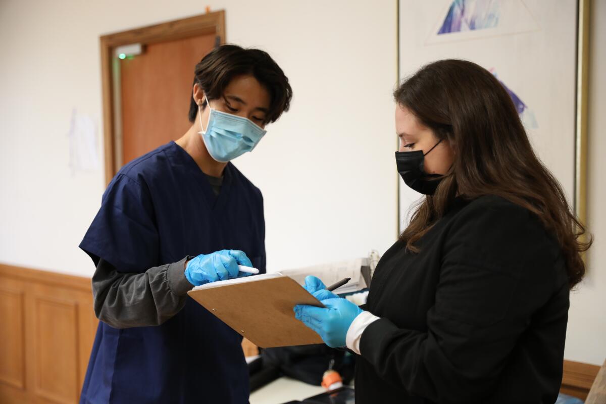 Staff at Easterseals of Southern California's Severe Behavior Services Center Thursday prepare for an ABA therapy session.