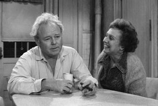 LOS ANGELES - DECEMBER 3: All In The Family. Episode: 'Archie's Chair'. Featuring Carroll O'Connor (as Archie Bunker) and Jean Stapleton (as Edith Bunker). Negative dated December 3, 1976. (Photo by CBS via Getty Images)