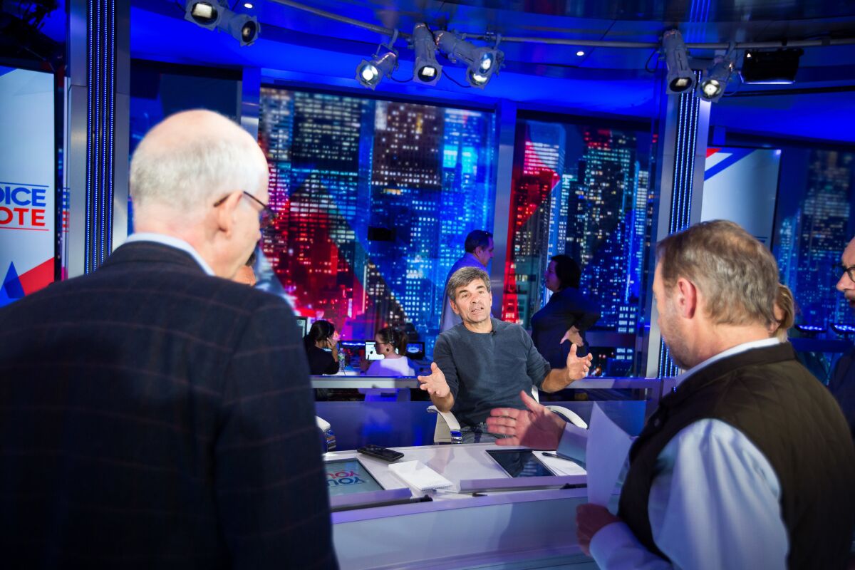 George Stephanopolous, center, speaks with James Goldston, president of ABC News, left, and Marc Burstein, senior executive producer at ABC News, right, during a rehearsal for ABC News' election night coverage.