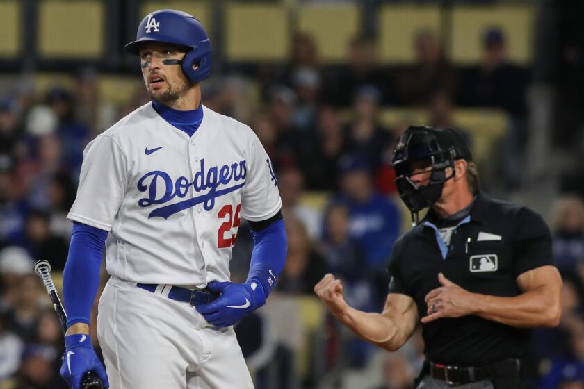 Dodgers Trayce Thompson reacts after striking out in the 2nd inning as the Dodgers play the Chicago Cubs