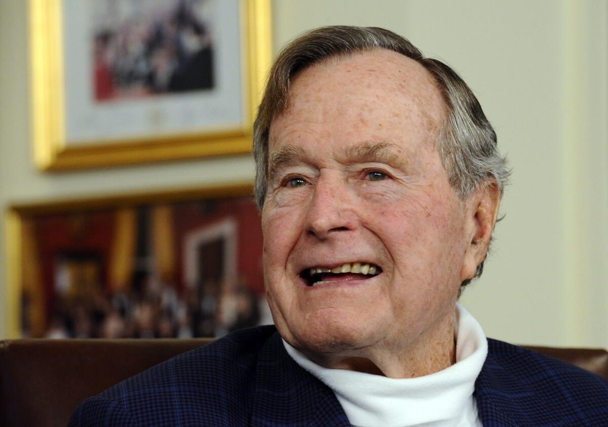 Former President George H.W. Bush is seen in his office in Houston in 2015.