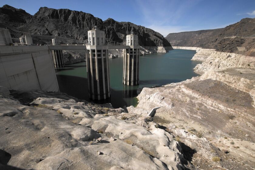 Lake Mead and Hoover Dam. In September, the third and deepest intake pipe into the lake will be opened to ensure that Las Vegas-area consumers have water no matter how far Mead falls.