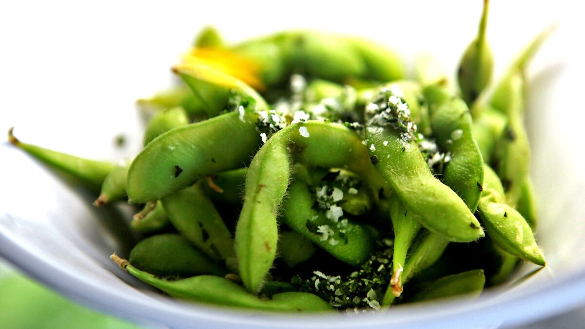 Researchers say eating soy, such as edamame, as a teen can help prevent breast cancer later.