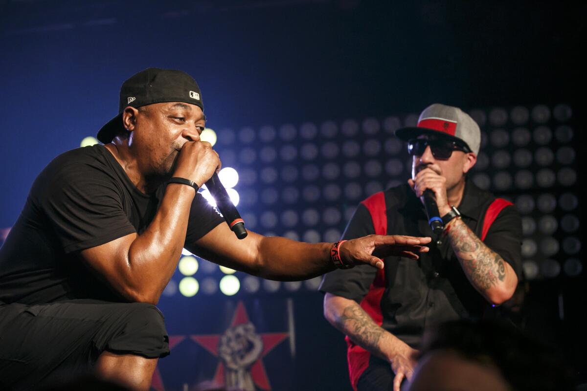 Chuck D, left, and B-Real perform at Tuesday's show.