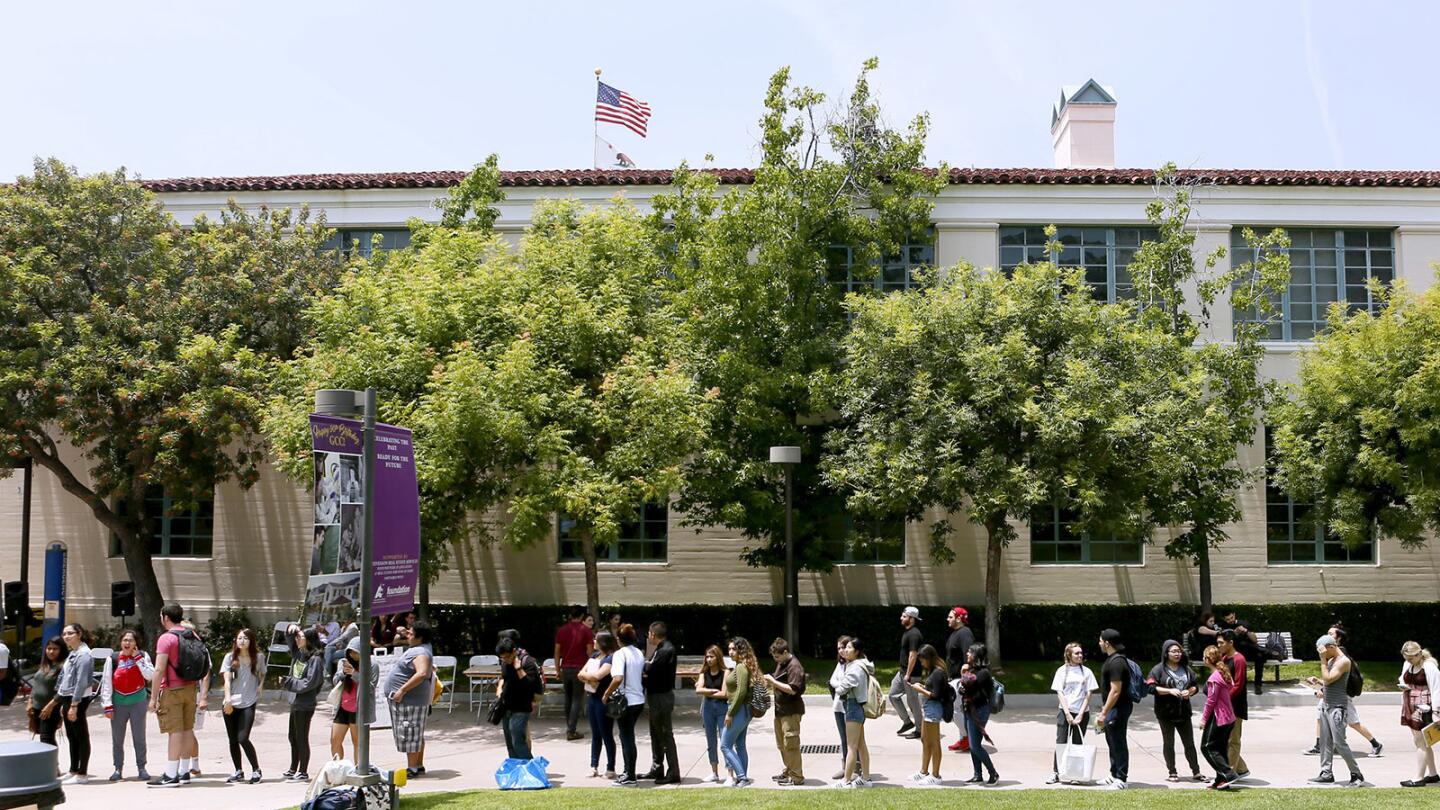 Photo Gallery: Puppies help relieve finals week stress at Glendale College