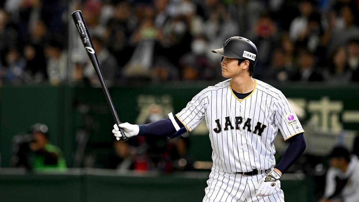 Shohei Ohtani bats during a game between Japan and Mexico at the Tokyo Dome on Nov. 10, 2016.