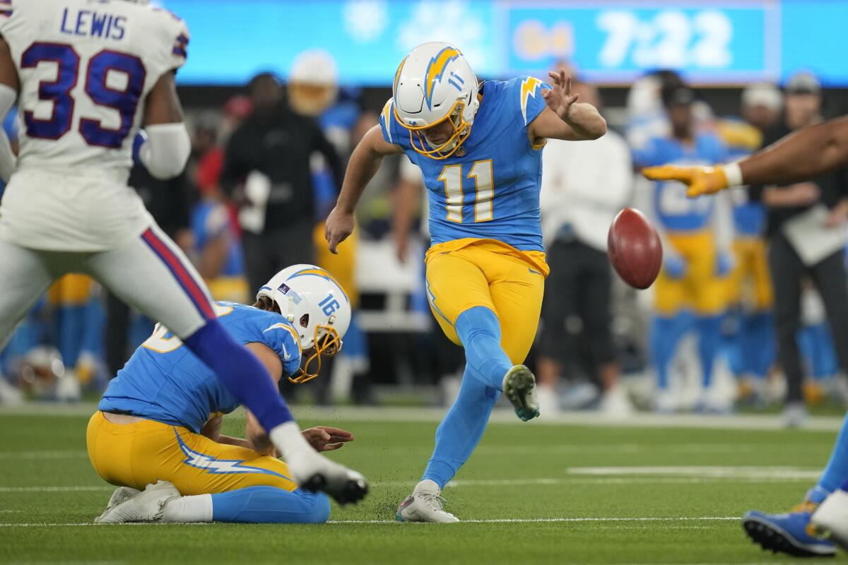 The Chargers' Cameron Dicker (11) kicks a field goal against the Bills.