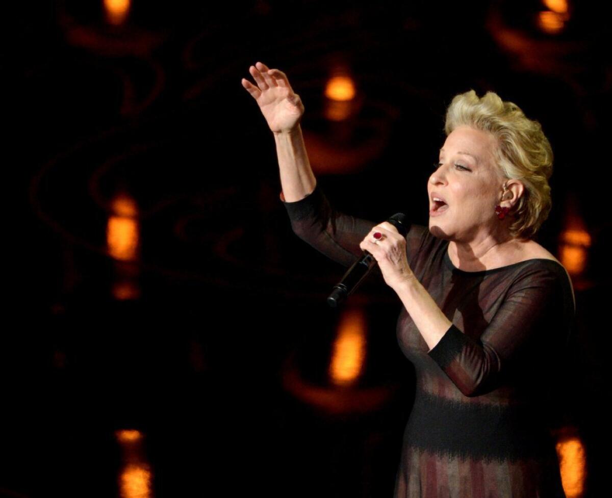 Bette Midler sings "Wind Beneath My Wings" accompanying the "In Memoriam" montage at the 86th Academy Awards.
