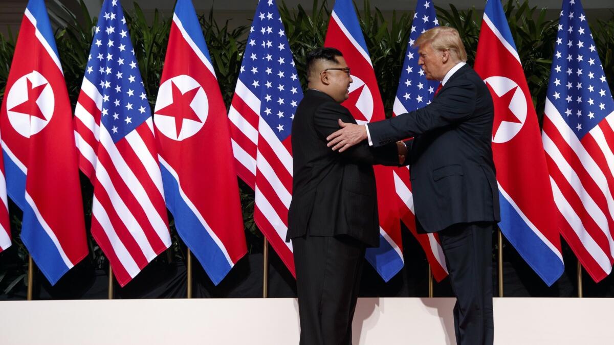 President Trump meets with North Korean leader Kim Jong Un on Sentosa Island, Singapore, on June 12, 2018.