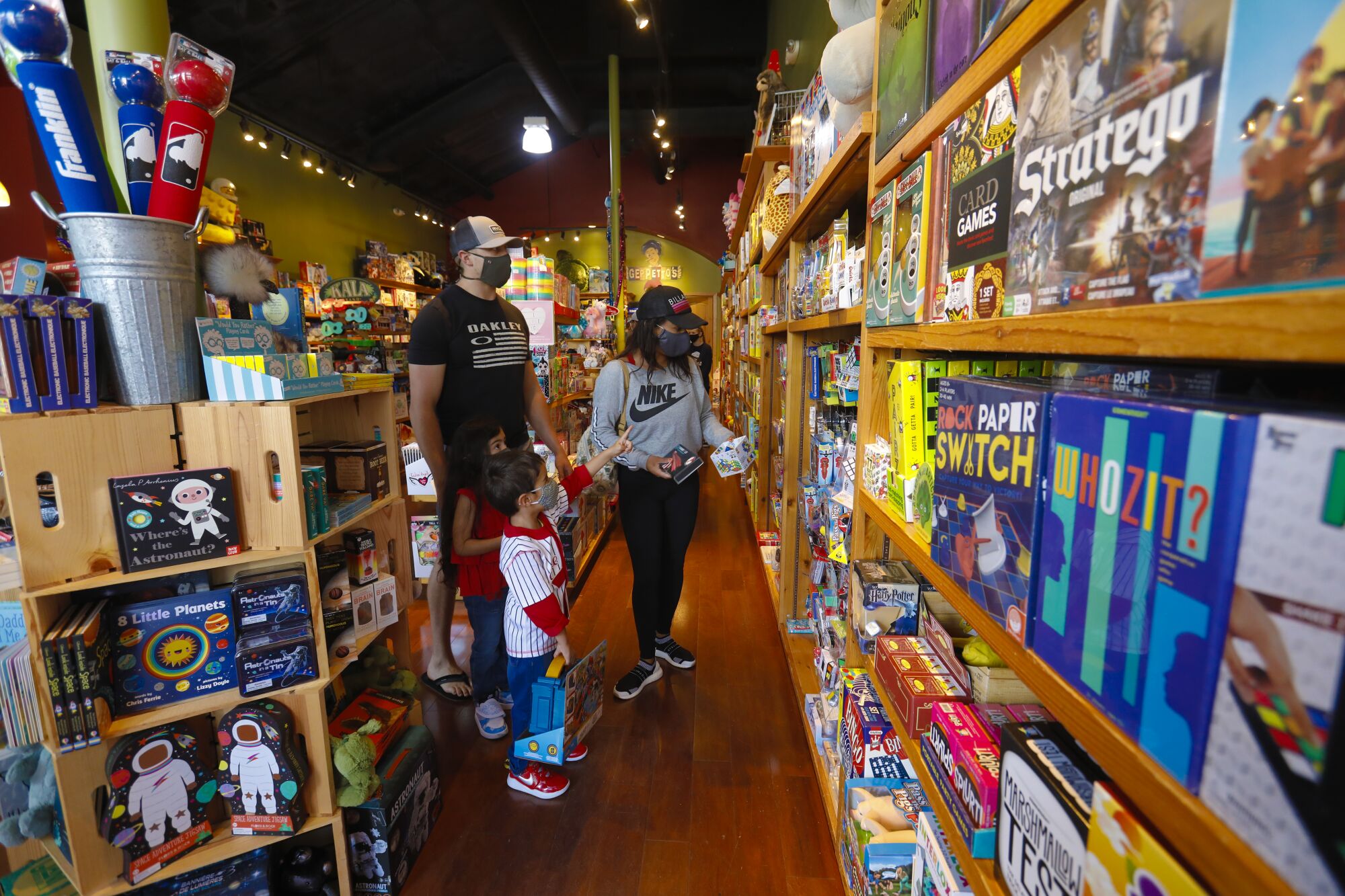 Customers browse Geppetto's Toys at Westfield UTC mall in May 2020.