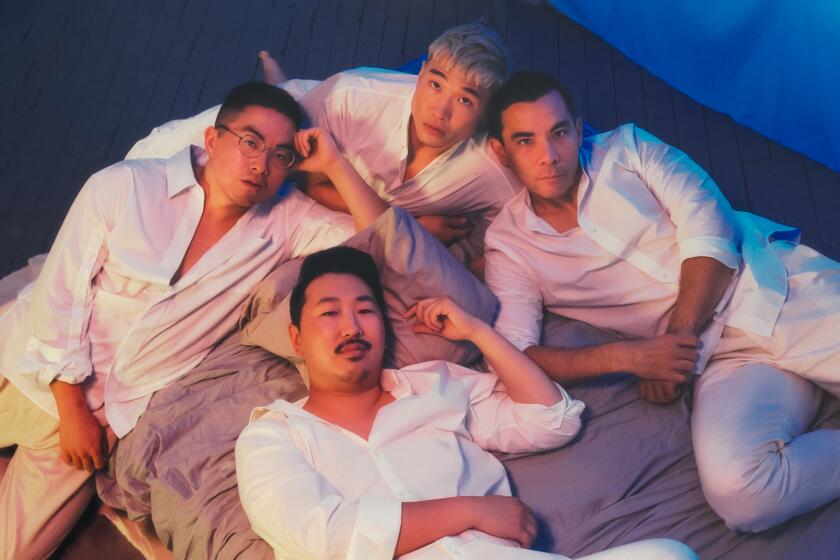 Brookyln, New York: Clockwise from left: stars Bowen Yang, Joel Kim Booster, Conrad Ricamora and director Andrew Ahn of "Fire Island" photographed in a studio. (CREDIT: Justin J Wee / For The Times)