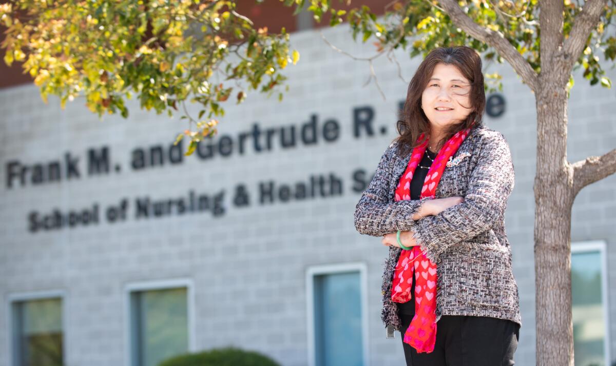 Golden West College Director of Nursing Alice Martanegara outside campus's nursing building Tuesday. 