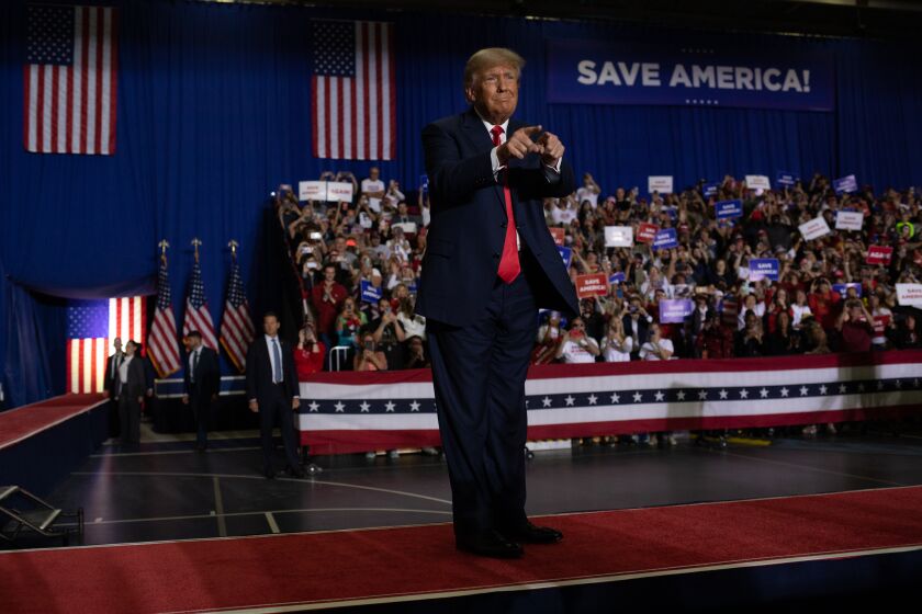 WARREN, MI - OCTOBER 01: Former President Donald Trump points to the crowd during a Save America rally on October 1, 2022 in Warren, Michigan. Trump has endorsed Republican gubernatorial candidate Tudor Dixon, Secretary of State candidate Kristina Karamo, Attorney General candidate Matthew DePerno, and Republican businessman John James ahead of the November midterm election. (Photo by Emily Elconin/Getty Images)