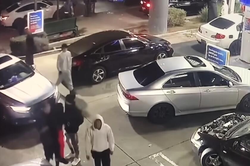 The Los Angeles Police Department on Wednesday released video from the scene and announced a $50,000 reward for information leading to the arrest of a driver who killed a 24-year-old woman during an illegal street takeover on Christmas Day.