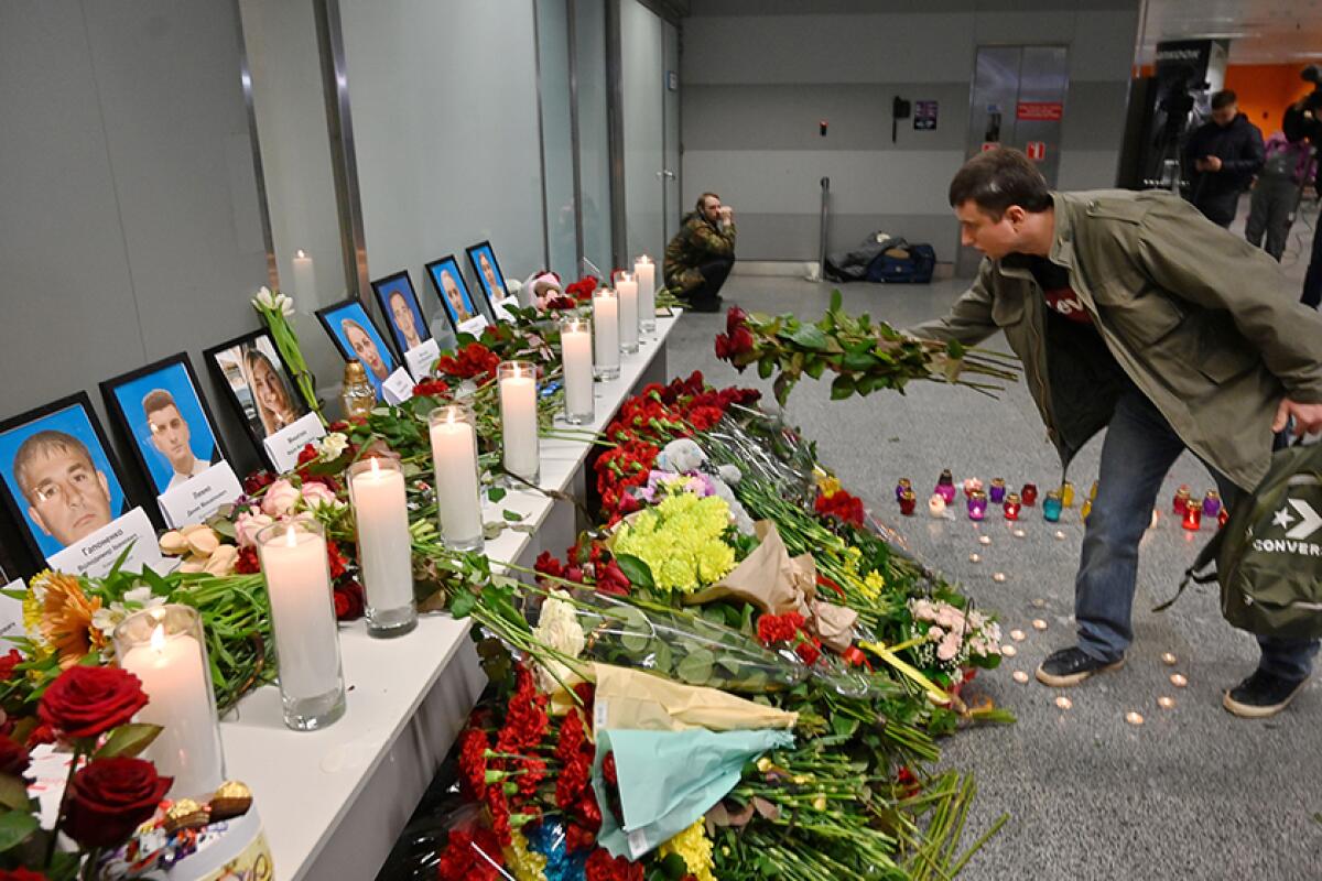 A memorial for crash victims at the airport in Kyiv, Ukraine.