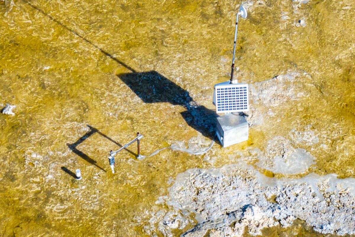     Monitoring equipment in a brine pool, part of the Owens Lake dust 