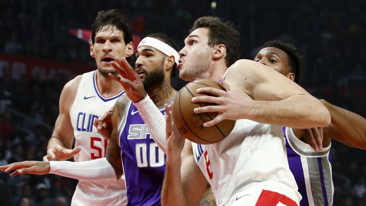 Clippers forward Danilo Gallinari drives to the basket against Kings guard Buddy Hield in the second quarter.