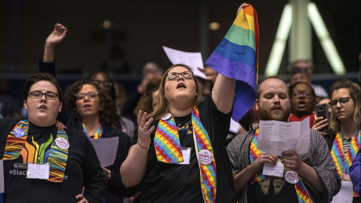 Protesters at the United Methodist Church's special session of the General Conference in St. Louis on Tuesday, Feb. 26.