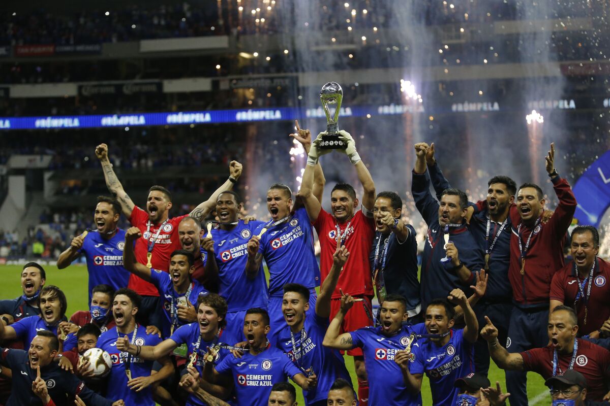 Cruz Azul players celebrate after winning the Mexican soccer league championship.