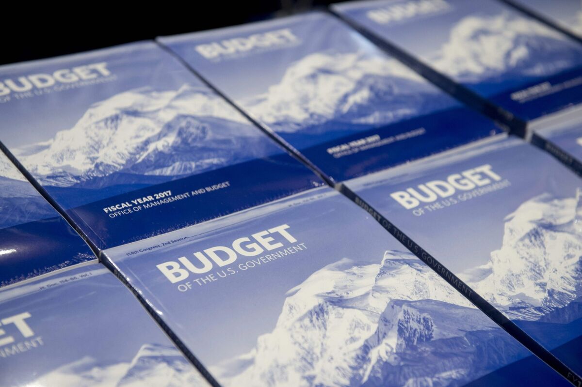Copies of President Barack Obama's Fiscal Year 2017 budget are distributed by the Senate Budget Committee in Washington.