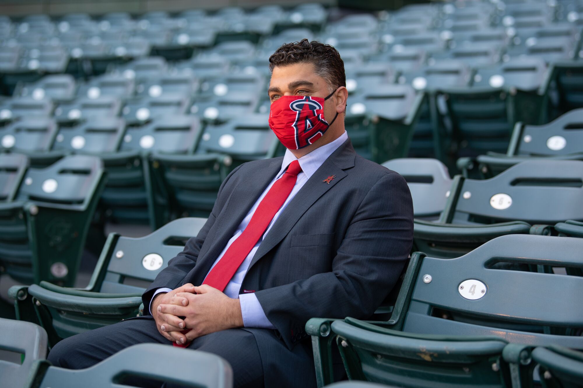 Angels general manager Perry Minasian sits at Angel Stadium before his introductory news conference in November.