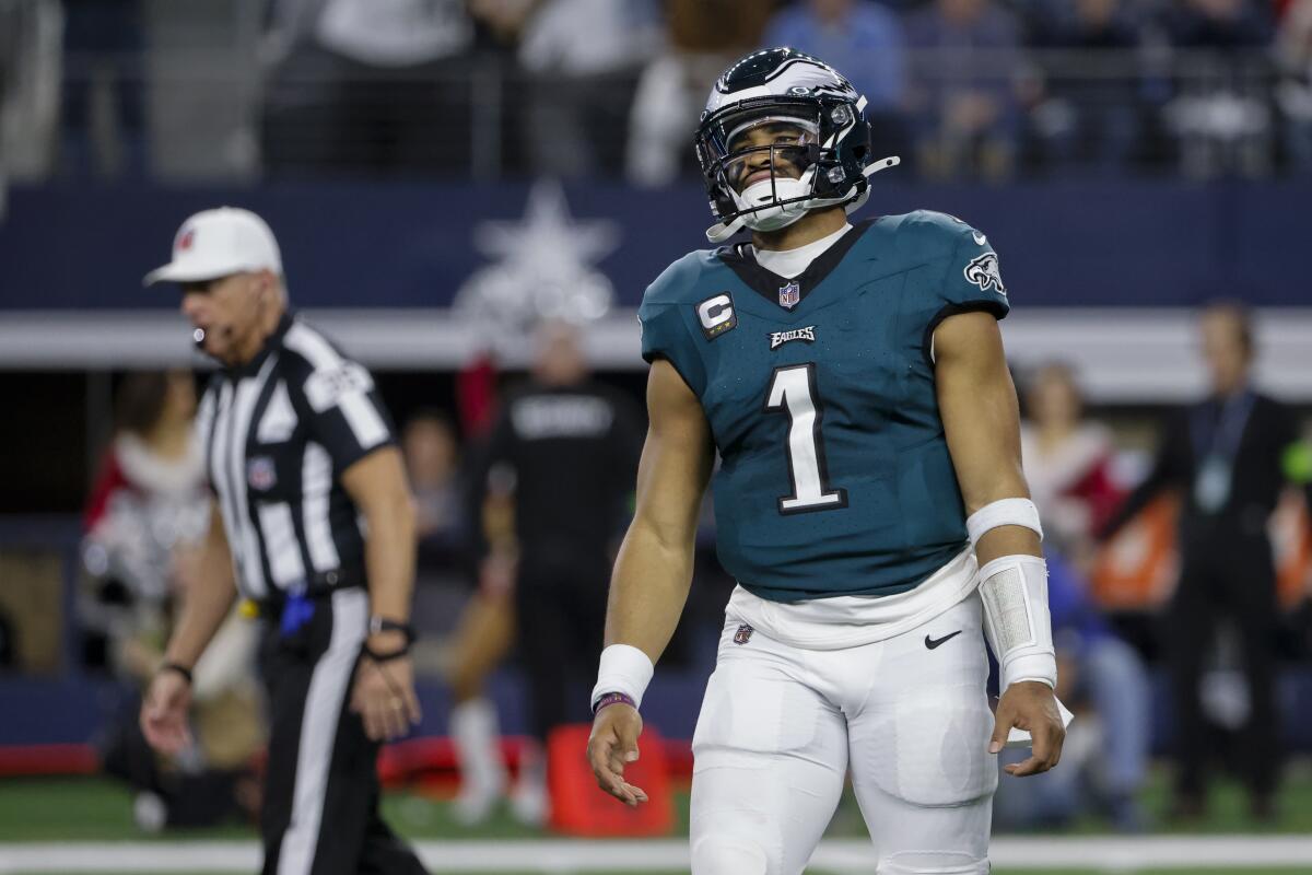 Eagles quarterback Jalen Hurts reacts after an incomplete pass.