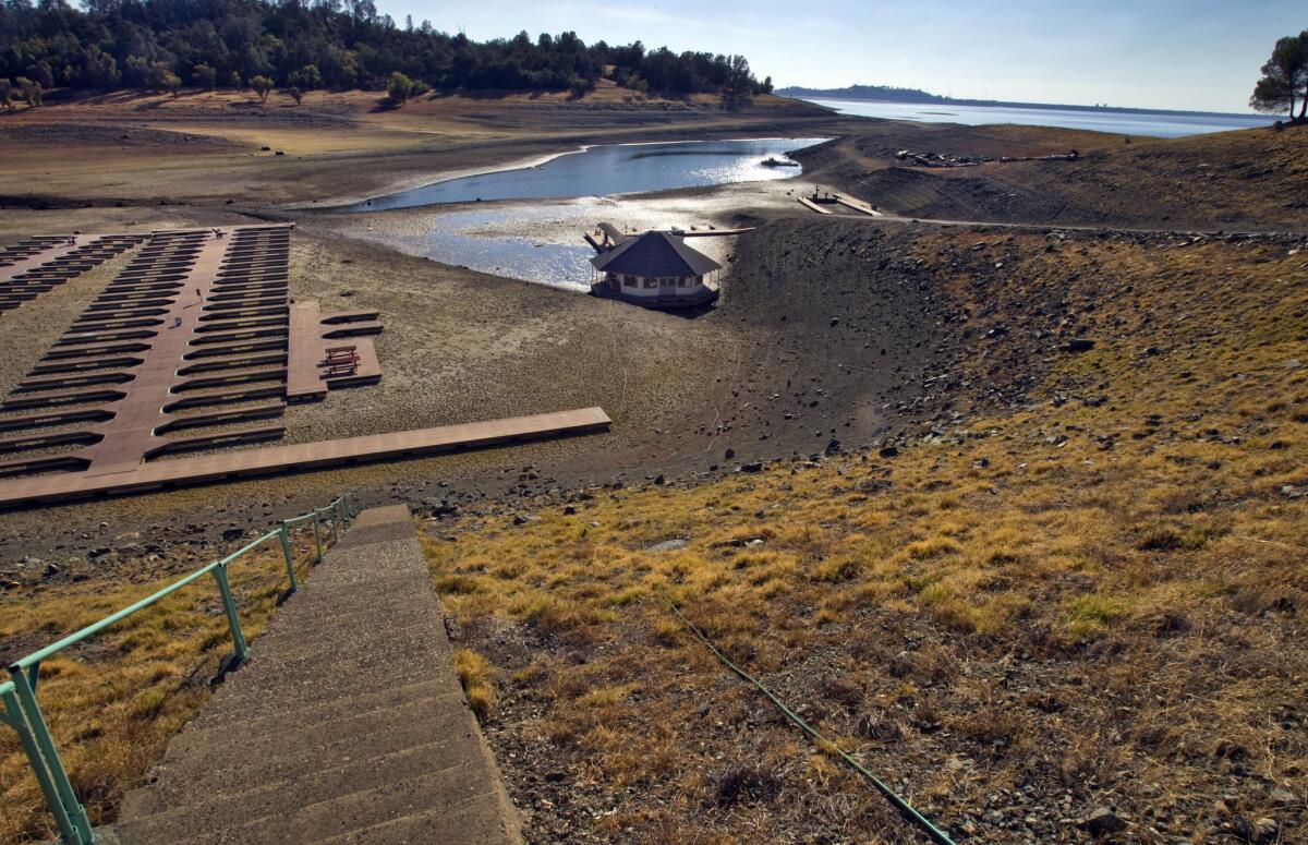 Severe drought conditions reveal over 600 empty docks sitting on dry, cracked dirt at Folsom Lake Marina, which is one of the largest inland marinas in California and is down 35 percent, at Folsom Lake State Recreational Area.