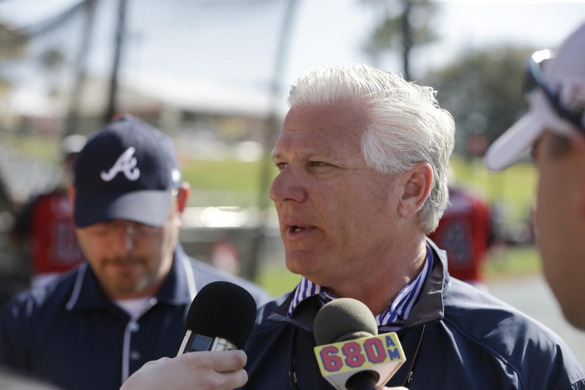 Then Braves General Manager Frank Wren meets with reporters at spring training.