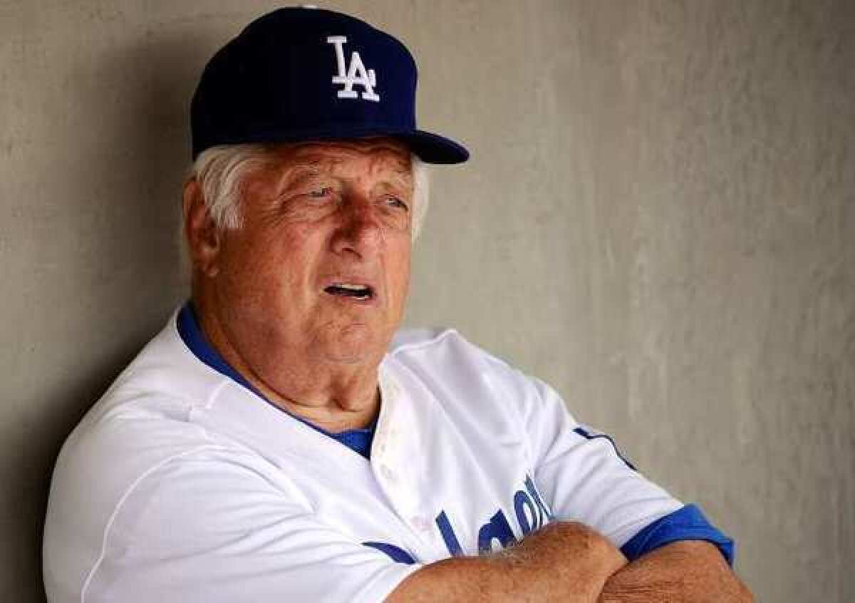 Hall of Fame manager Tommy Lasorda suffered a "mild heart attack" Monday.
