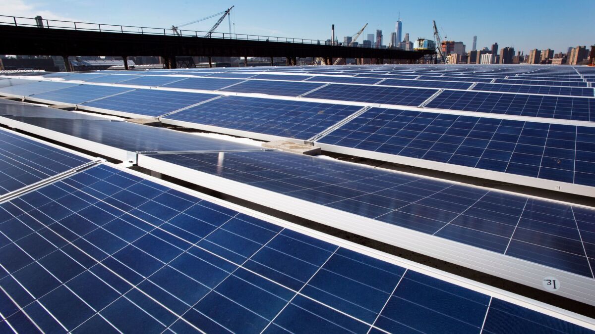 A rooftop is covered with solar panels at the Brooklyn Navy Yard on Feb. 14, 2017, in New York.