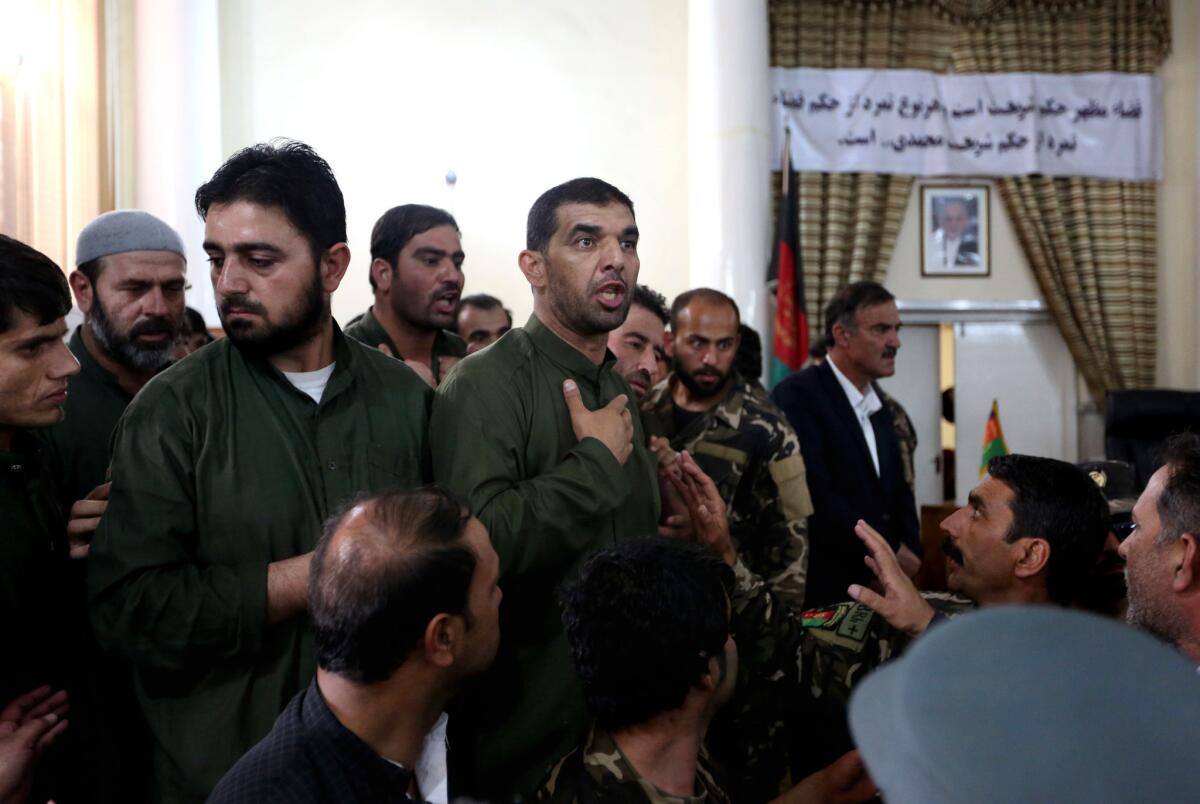 A defendant speaks during his trial in Kabul, Afghanistan, on May 3.