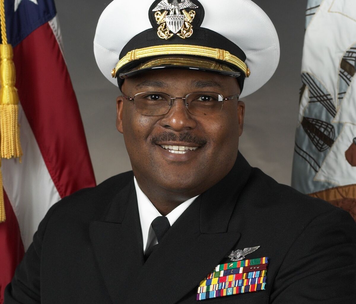 Dennis Eley is shown wearing his Navy uniform.