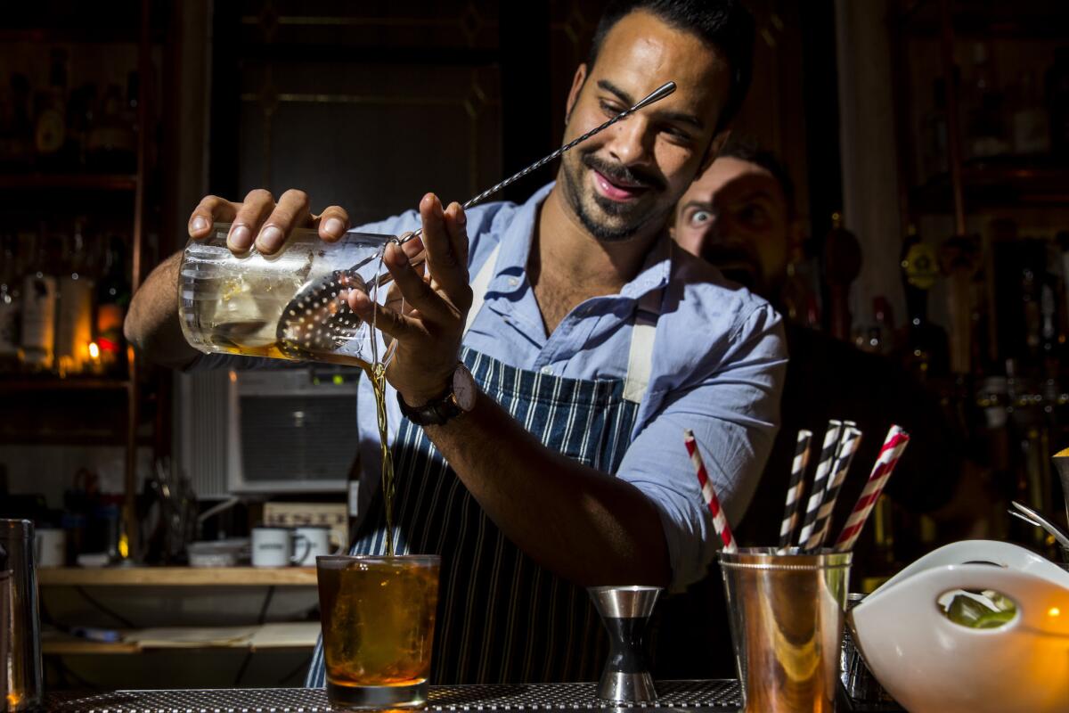 Julian Cox pours a cocktail at Brilliantshine in Santa Monica on Oct. 16, 2014.