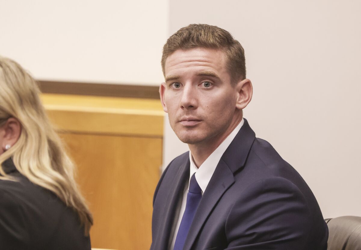 Former La Mesa police Officer Matthew Dages appears at a court hearing at the El Cajon courthouse on Tuesday, Aug. 10, 2021.