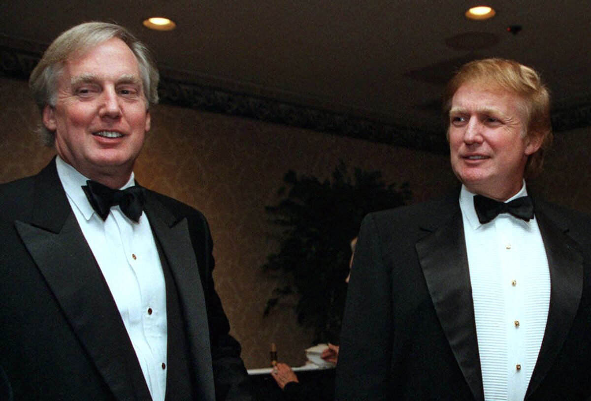 Robert Trump, left, joins real estate developer and presidential hopeful Donald Trump at an event in New York. 