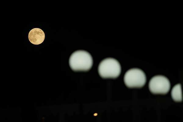 A full moon is seen from Gaza City on Aug. 31, 2012. According to NASA, this is the second time in this month that a full moon is seen -- the first was Aug. 1 to 2. This phenomenon, which is referred to as the blue moon, happens every two and a half years on average.
