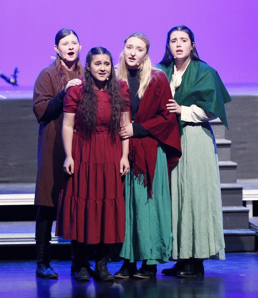 Mothers and daughters sign in a play with music called 'A Journey of Angels,' written by Brent Beerman at Crescenta Valley High School on Friday, November 9, 2018. The show, which is described as a "work in process," was developed from the book 'My Mother's Voice,' written by Kay Mouradian, a story about a family's ordeal during the 1915 Armenian Genocide.
