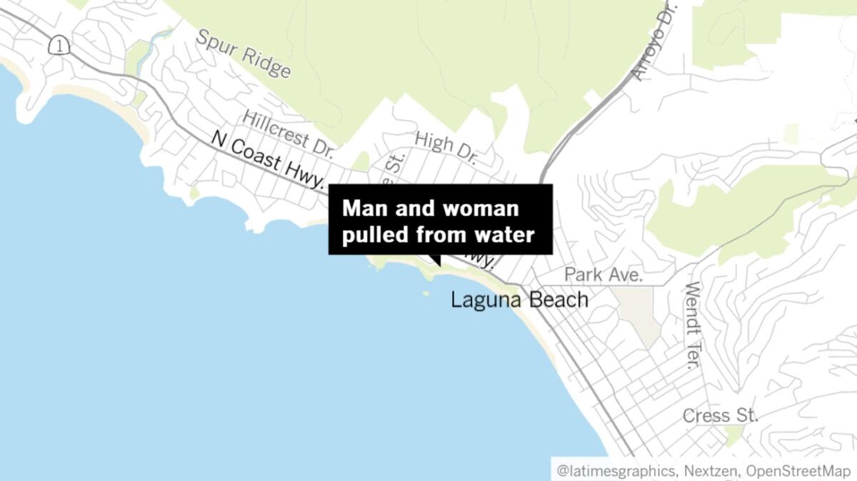 A semiconscious woman and an unconscious man were pulled from the water Thursday evening near Bird Rock in Laguna Beach, authorities said.