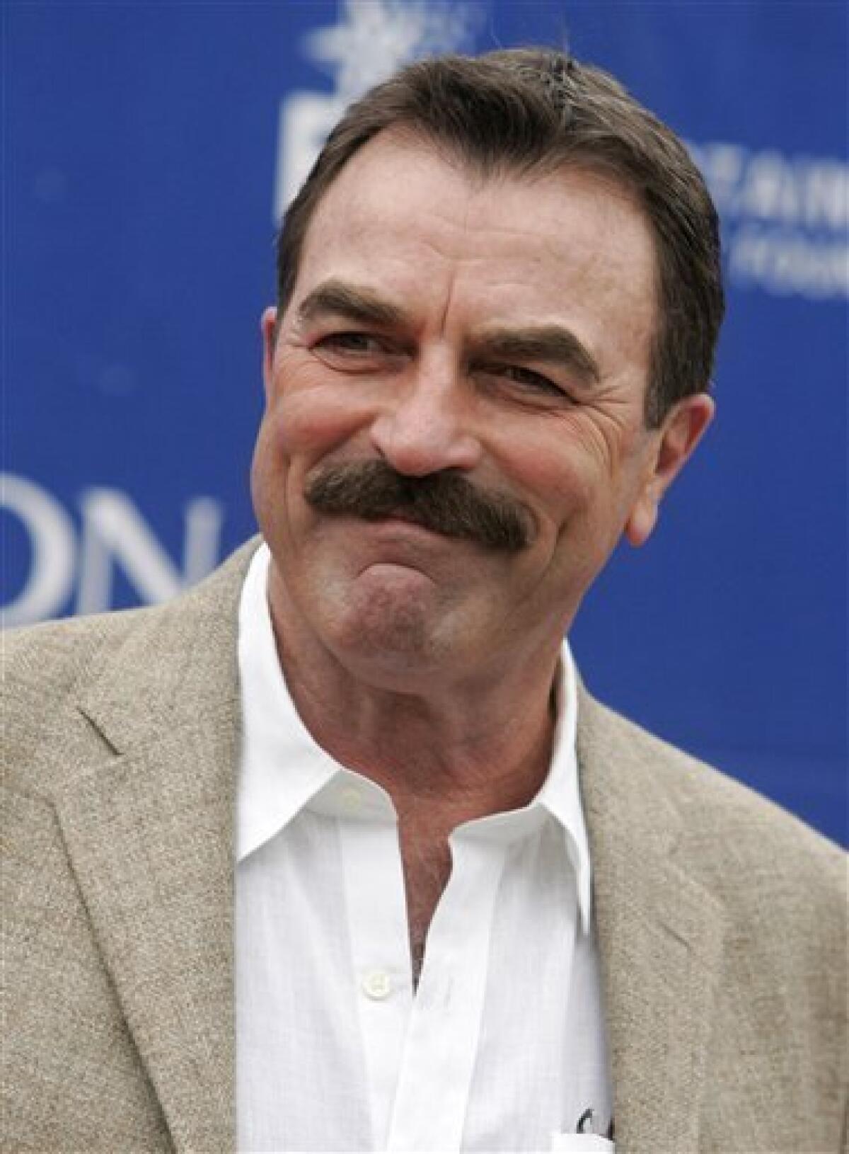 In this Saturday, May 10, 2008 photo, actor Tom Selleck arrives at the 15th Annual Entertainment Industry Foundation Revlon Run/Walk For Women in Los Angeles. Actor Tom Selleck has been awarded more than $187,000 after a California jury found the actor was duped into buying a lame horse. (AP Photo/Dan Steinberg)