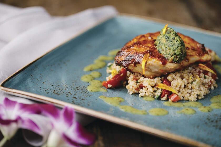 Paul's signature dish, Achiote Roasted Fish.